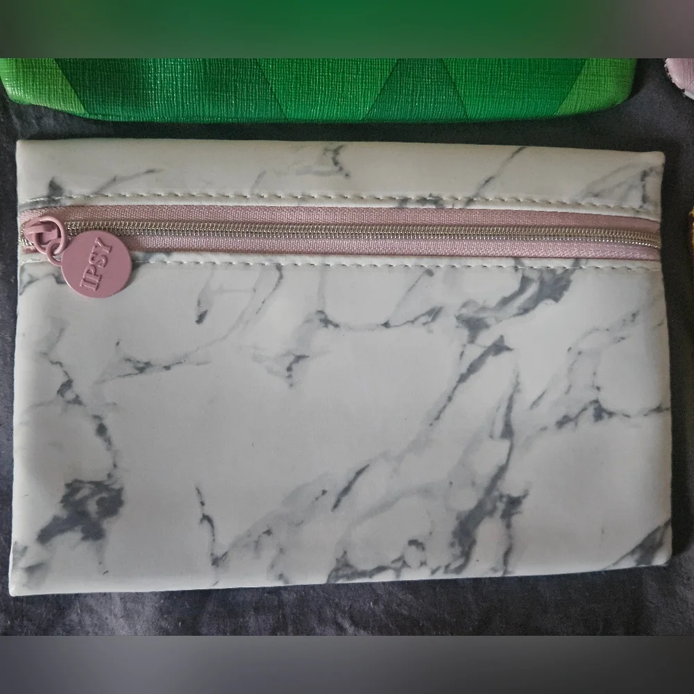 4 ipsy makeup/travel bags